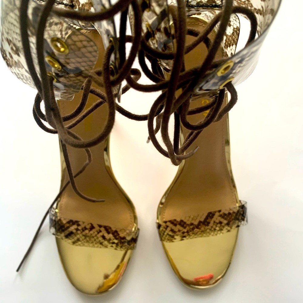 Cheetah print smoke clear heel with gold insole.